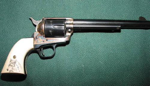45 Colt Single Action Army with scrimshaw grips