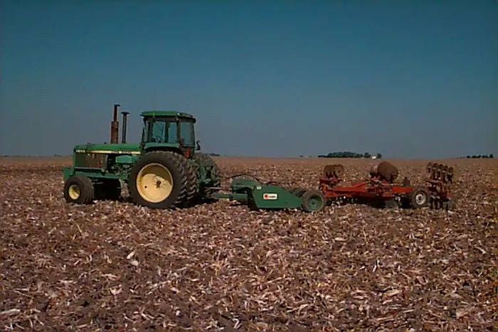 My John Deere 4650 tractor pulling two implements