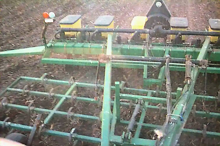 John Deere planter behind a tillage tool used to incorporate chemicals