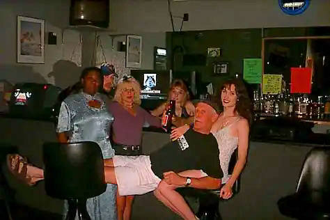 picture: Jack Corbett and his stripper pals in the Dollies Playhouse back bar