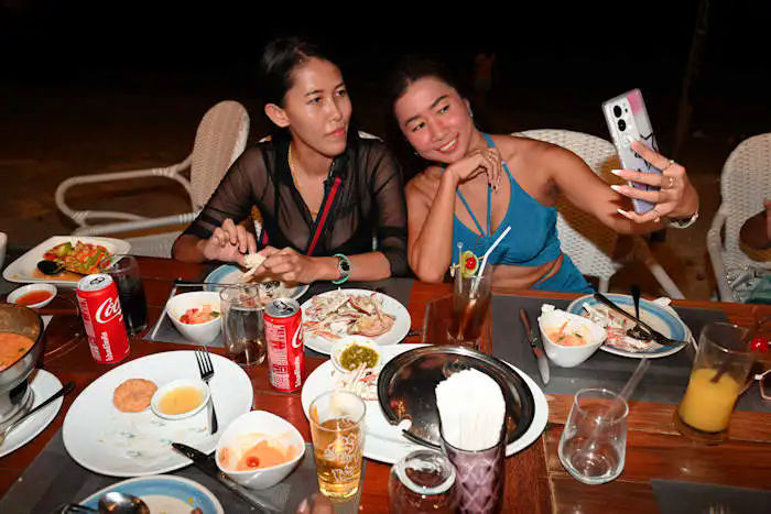 picture of Phang with Nikky at the Surf and Turf Restaurant