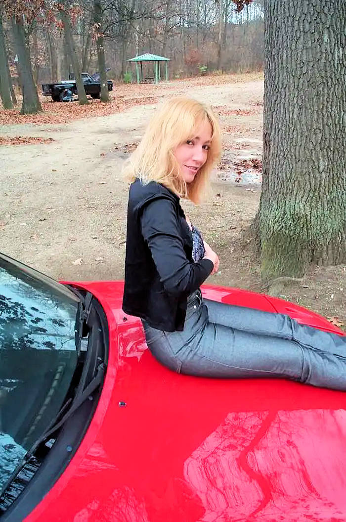 picture: Delilah adorning the hood of Jack Corbett's supercharged Mazda Miata sportscar