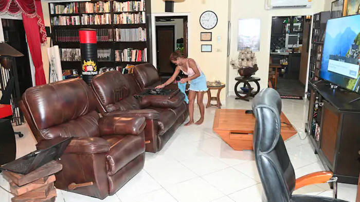 Koy cleanng Jack's condo
