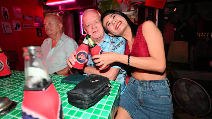 Rod and new friend at the Final Naklua Nikky birthday