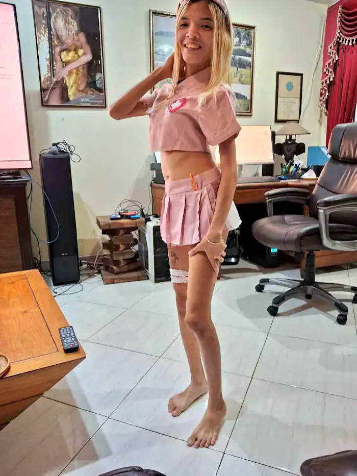 Mali in Jack's condo practicing Soi Six Karaoke Repent